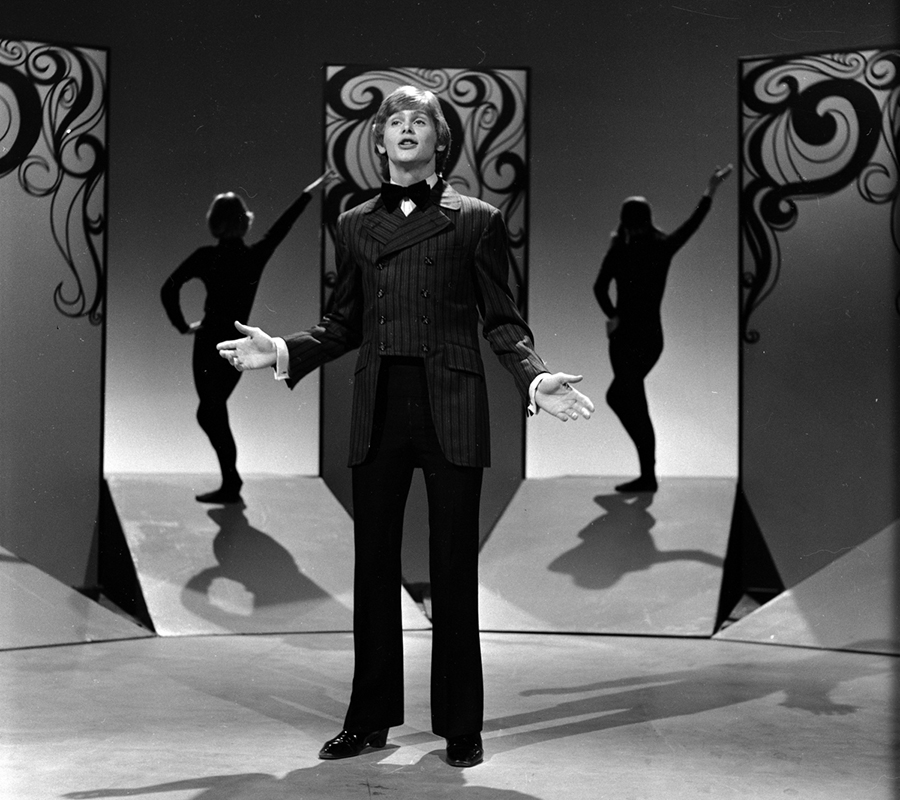 A black and white image of John Farnham performing on Uptight in 1969. 