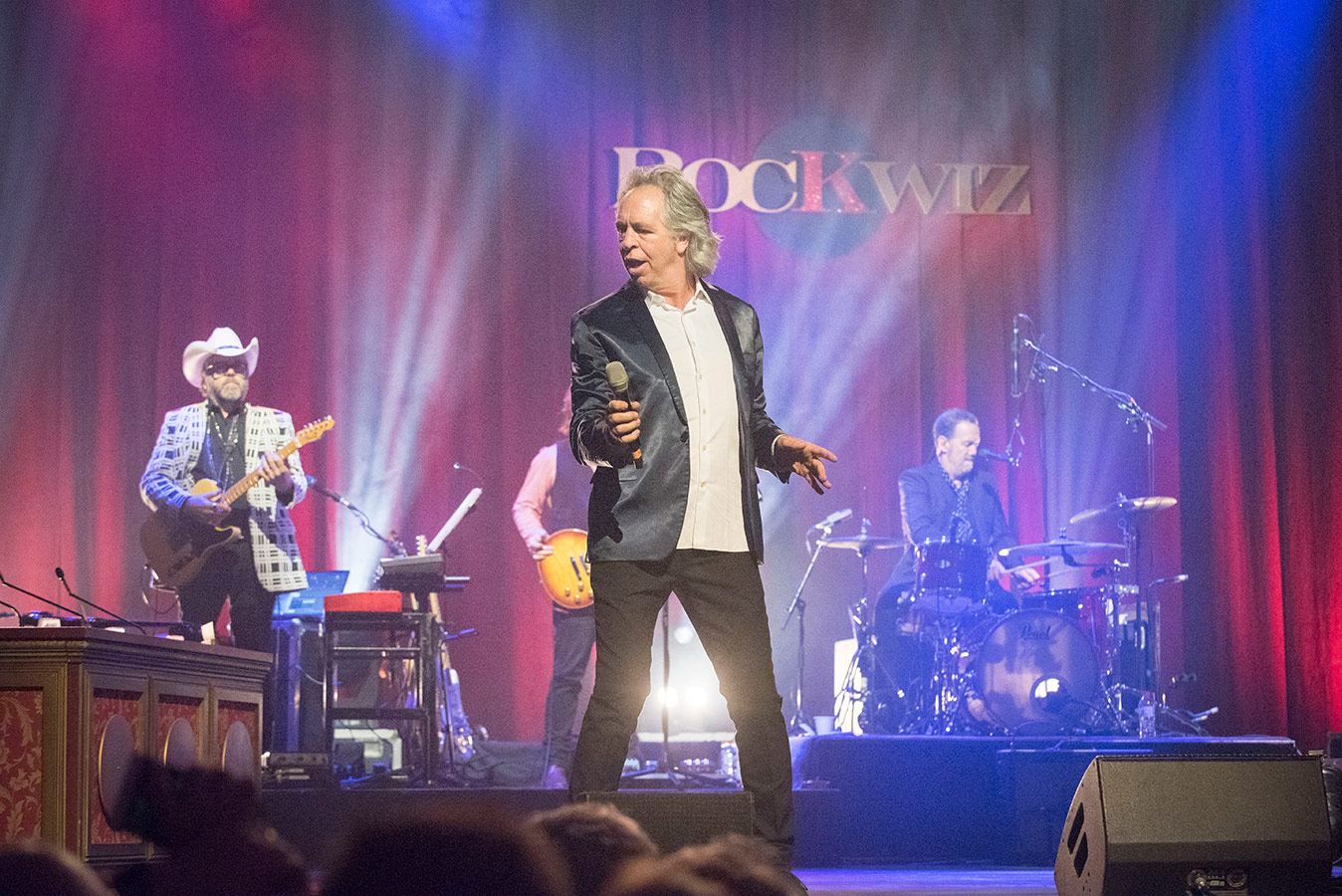 Brian Nakervis and the RocKwiz Orkestra on stage. Photograph courtesy of Renegade