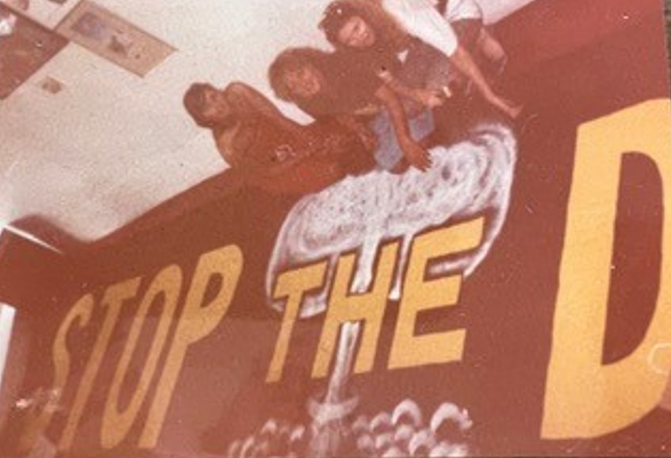 Jenny, Tracee and Dee painting the Stop the Drop banner, February 1983. 