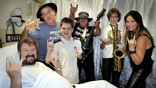 Deryn Hinch with The Transplants. Photo courtesy Paulie Stewart.